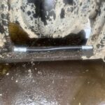 重機に繋がっている一本のホース