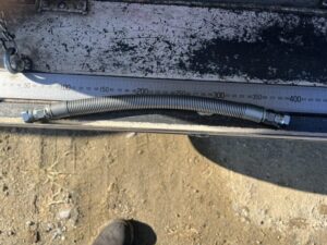 地面に置かれたホース